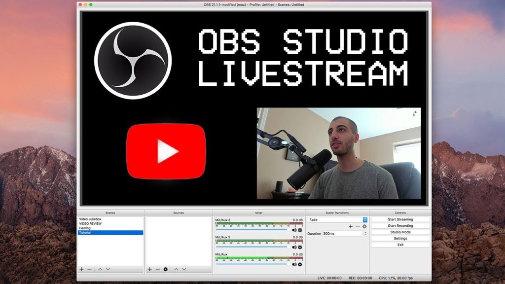 A person setting up OBS (Open Broadcaster Software) for YouTube live streaming.